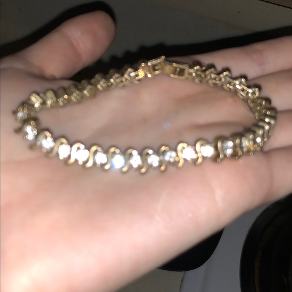 Gold and diamond bracelet (not real)